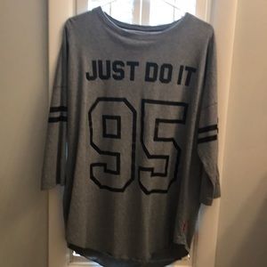 Nike 3/4 sleeve shirt. New without tags,